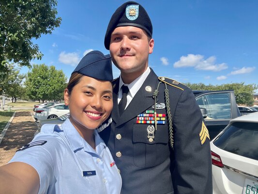 Rivera, left, poses for a selfie with husband, Yan, following her Basic Military Training graduation.
