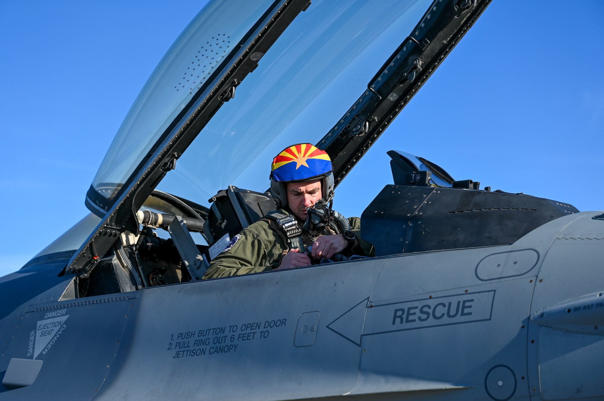 A pilot assigned to the Air National Guard Air Force Reserve Command Test Center prepares to fly an F-16 Fighting Falcon at Eielson Air Force Base, Alaska, May 5, 2023, during Northern Edge 2023. AATC personnel tested an electronic warfare countermeasure that can be housed in removable, adaptable pods under aircraft wings or fuselages.