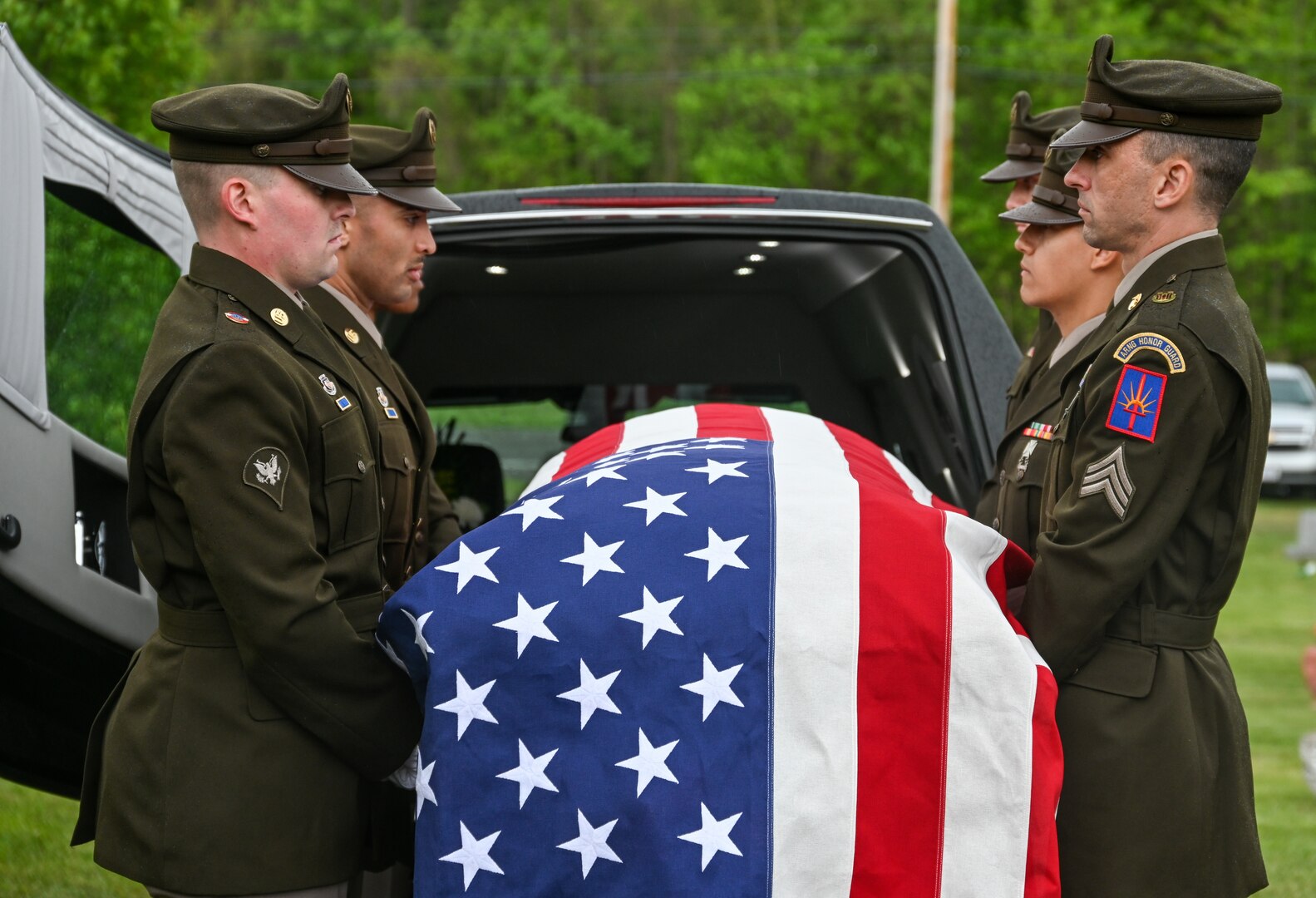 New York National Guard Honor Guard Soldiers receive the remains of 1st Lt. John Thomas, a World War II Army Air Forces pilot killed in 1943, at the Rose Cemetery in North Rose, New York, May 20, 2023. Thomas was killed in action during a bombing mission and his remains were not identified until 2022.
