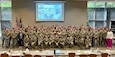 Participants of the Army Medical Department’s 2023 Junior Leadership Course pose for a photo at Fort Belvoir, Virginia, in April. One Soldier and one civilian affiliated with U.S. Army Medical Logistics Command -- Capt. Elizabeth Martinez and Ash-Leigh Tensley -- were among the group of 100 attendees, which included 79 officers, 15 enlisted Soldiers and six Army Civilians. (Courtesy)