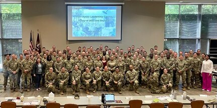 Participants of the Army Medical Department’s 2023 Junior Leadership Course pose for a photo at Fort Belvoir, Virginia, in April. One Soldier and one civilian affiliated with U.S. Army Medical Logistics Command -- Capt. Elizabeth Martinez and Ash-Leigh Tensley -- were among the group of 100 attendees, which included 79 officers, 15 enlisted Soldiers and six Army Civilians. (Courtesy)