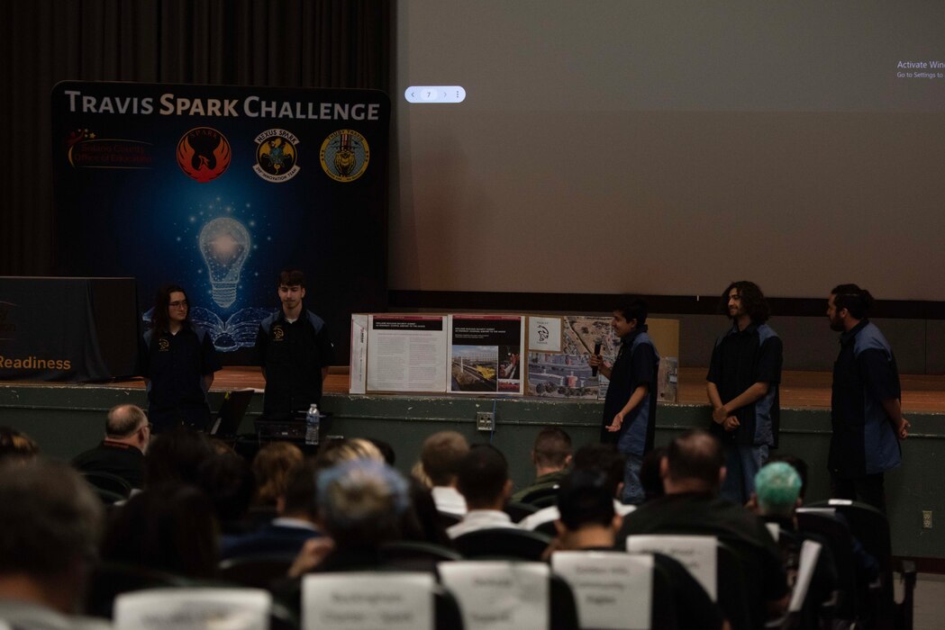 Students present to a crowd