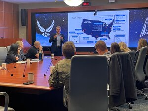 Timothy Sakulich, executive director, Air Force Research Laboratory, or AFRL, briefs Civic Leaders and AFRL senior leaders about AFRL priorities during the AFRL inaugural cohort of civil leaders May 2, 2023, at Wright-Patterson, Air Force Base, Ohio. (U.S. Air Force photo / Kiara Palmer)