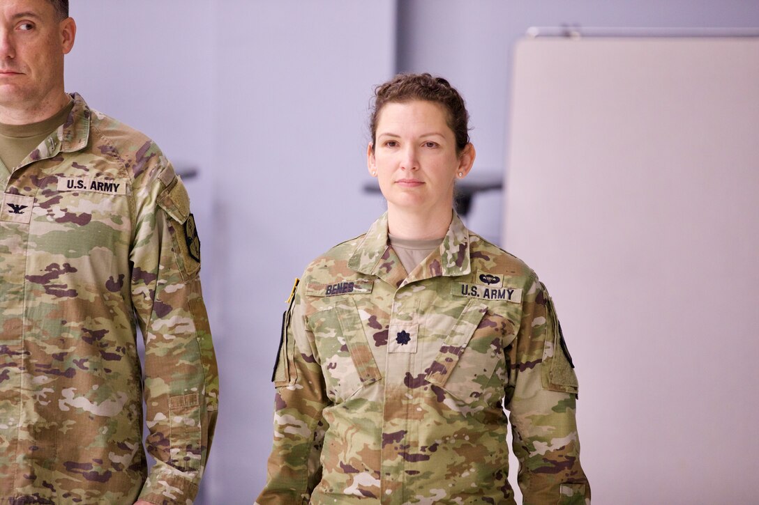 A females Soldier, Lt. Col. Zehra Tenay Benes, stands at attention just prior to assuming command.