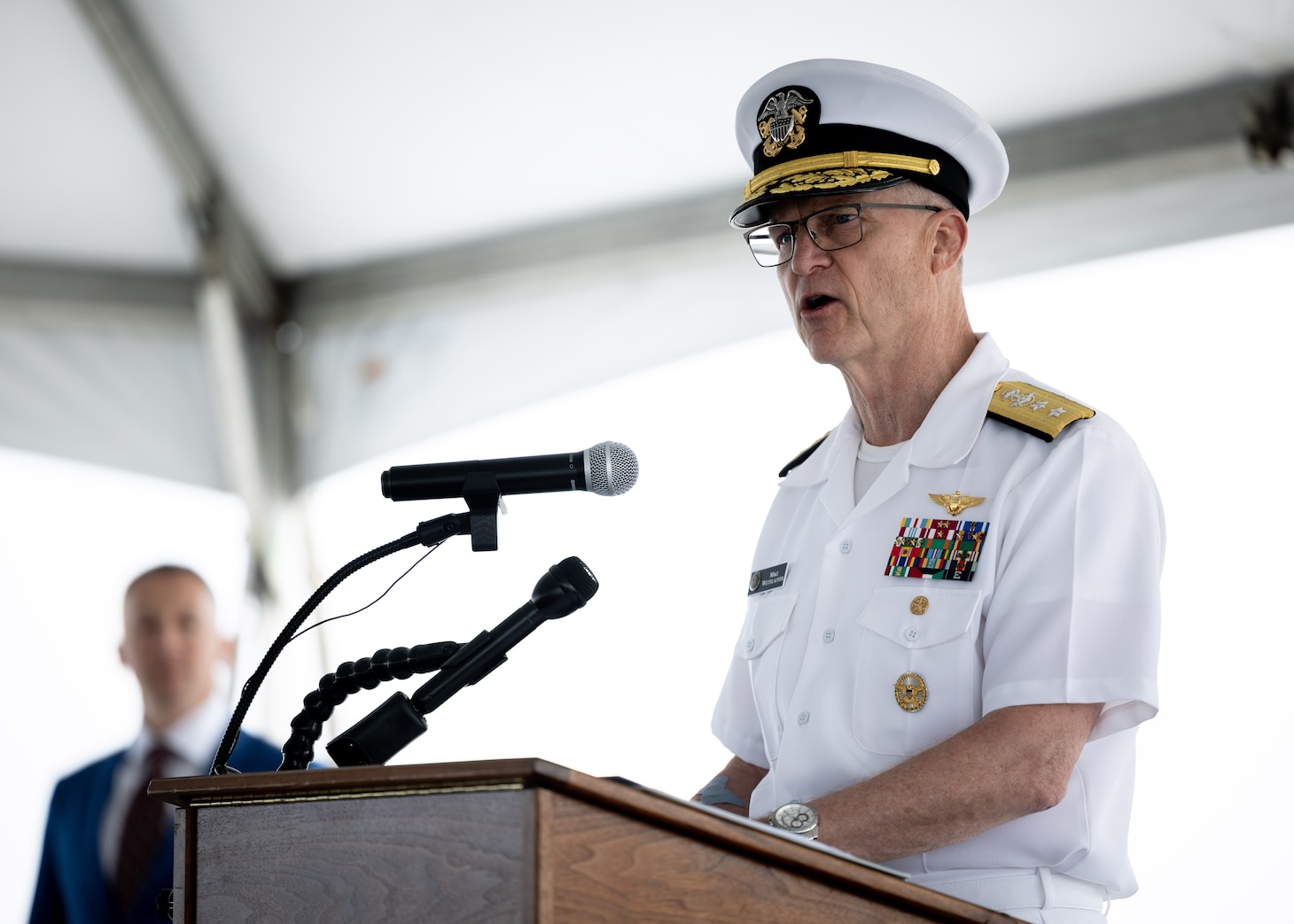 Rear Adm. Michael Wettlaufer, USN Commander, Military Sealift Command (MSC), delivers welcoming remarks during MSC’s National Maritime Day ceremony aboard USNS Comfort (T-AH 20) May 22, 2023. National Maritime Day honors the thousands of dedicated merchant mariners who served aboard United States vessels around the world.