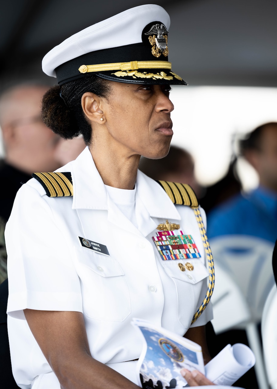 Capt. Janice Smith, Chief of Staff, Military Sealift Command (MSC), listens to welcoming remarks during MSC’s National Maritime Day ceremony aboard USNS Comfort (T-AH 20) May 22, 2023. National Maritime Day honors the thousands of dedicated merchant mariners who served aboard United States vessels around the world.