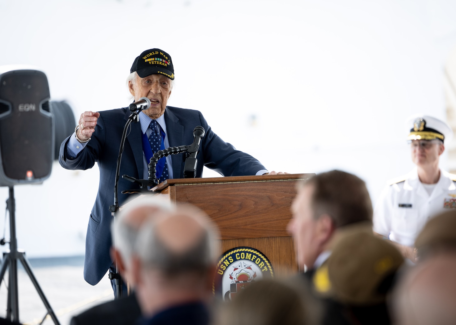 Dave Yoho, U.S. Merchant Marine and World War II Veteran, delivers remarks during Military Sealift Command’s National Maritime Day ceremony aboard USNS Comfort (T-AH 20) May 22, 2023. National Maritime Day honors the thousands of dedicated merchant mariners who served aboard United States vessels around the world.