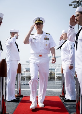 Rear Adm. Michael Wettlaufer, USN Commander, Military Sealift Command (MSC), is piped aboard during MSC’s National Maritime Day ceremony aboard USNS Comfort (T-AH 20) May 22, 2023. National Maritime Day honors the thousands of dedicated merchant mariners who served aboard United States vessels around the world.