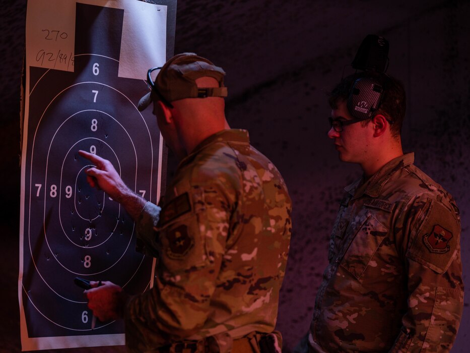 U.S. Air Force Staff Sgt. Alexander Klein, 56th Security Forces Squadron unit trainer, checks his target’s score, May 17, 2023, at Luke Air Force Base, Arizona.
