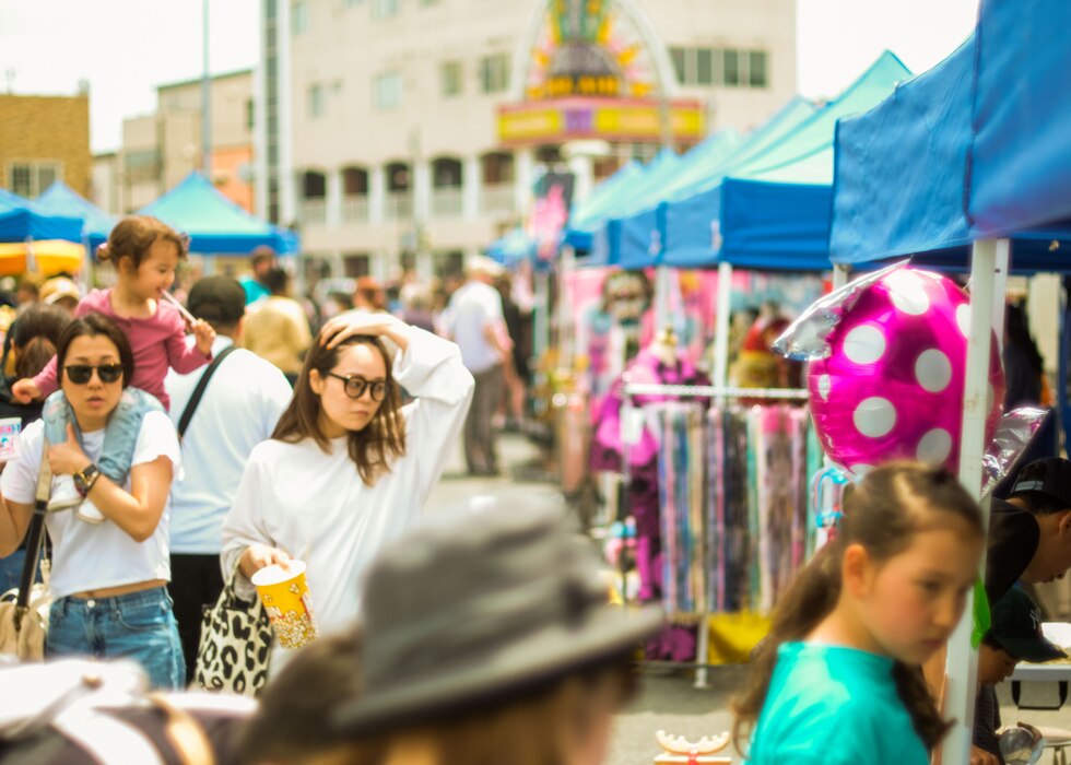 U.S. and Japanese community members visit vendors during the first Market Day at Misawa Air Base, Japan, May 21, 2023. On and off-base community members gathered for a day of shopping, eating, and other family activities, reinforcing the commitment to strengthen the Japan-U.S. alliance and supporting the local community.