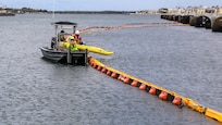 Joint Task Force-Red Hill (JTF-RH) contractors retrieve a kayak after performing a survey of Hotel Pier on Joint Base Pearl Harbor-Hickam, Hawaii, May 16, 2023. JTF-RH is in phase three of its five-phase defueling plan. Personnel are focused on completing repairs, quality control tasks, training, response preparation, the National Environmental Policy Act Environmental Assessment, regulatory approvals and operational planning for all major milestones. This extensive preparatory work will help ensure the safe and expeditious defueling of the Red Hill Bulk Fuel Storage Facility. (DoD photo by U.S. Army Sgt. Kyler L. Chatman)