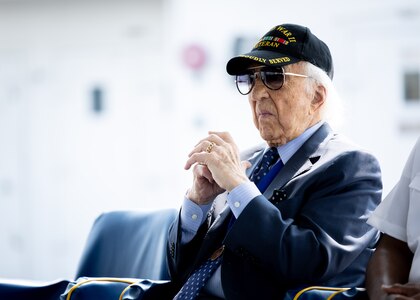 Dave Yoho, U.S. Merchant Marine and World War II Veteran, listens to welcoming remarks during Military Sealift Command’s National Maritime Day ceremony aboard USNS Comfort (T-AH 20) May 22, 2023. National Maritime Day honors the thousands of dedicated merchant mariners who served aboard United States vessels around the world.