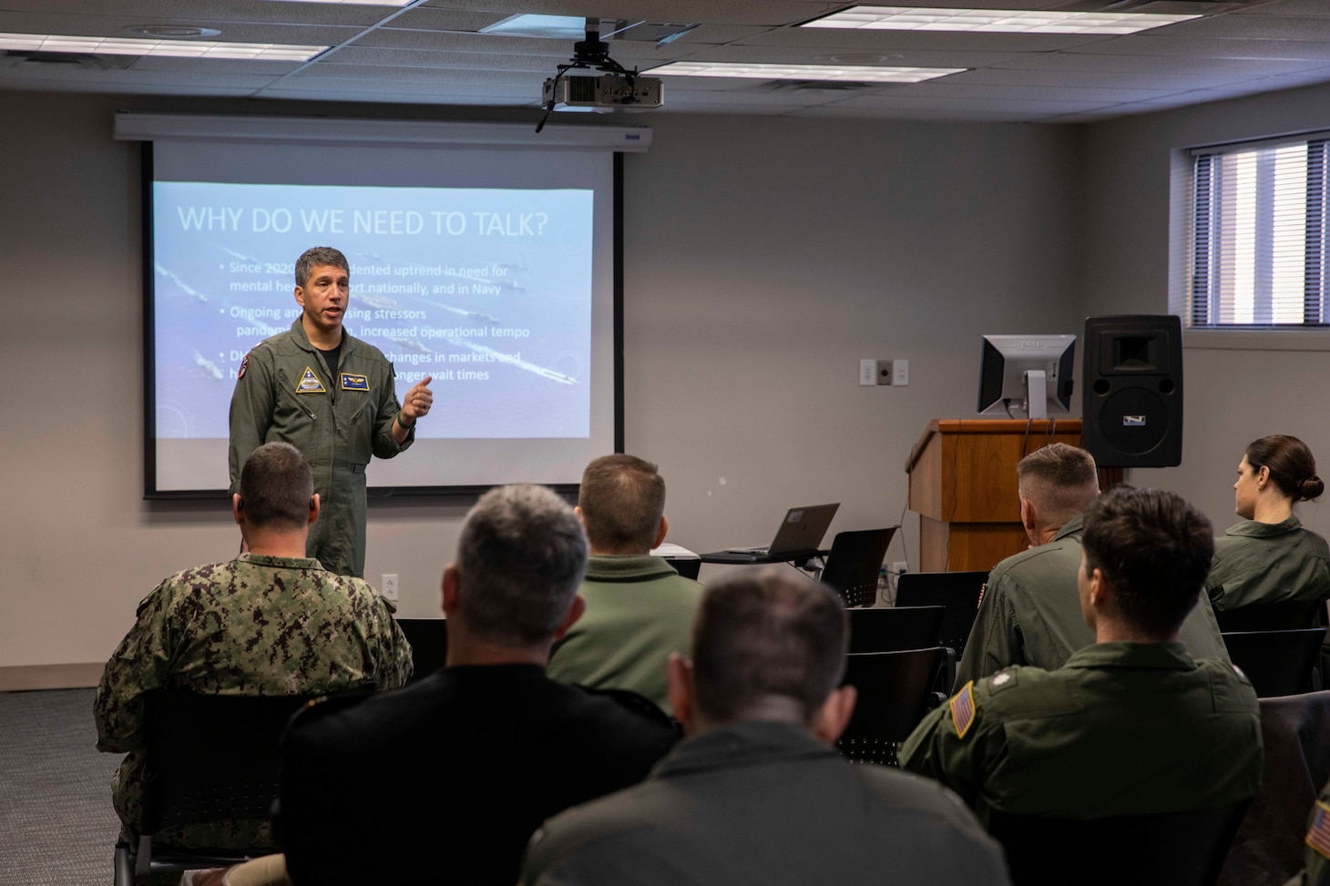 Cmdr. Ravi DeSilva, force mental health officer of Commander, Naval Air Force Reserve, speaks at the Fleet Logistics Support Wing Leadership conference.