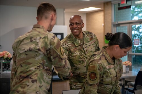 Airmen shake hands