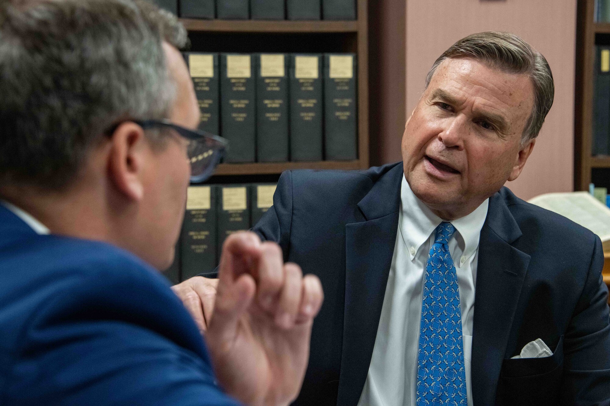 Ambassador (retired) W. Stuart Symington (right), answers questions from Patrick Charles, Air Force Historical Research Agency senior historian