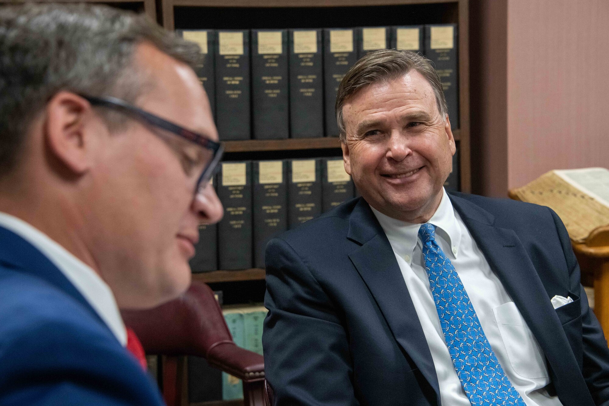 Ambassador (retired) W. Stuart Symington (right), answers questions from Patrick Charles, Air Force Historical Research Agency senior historian