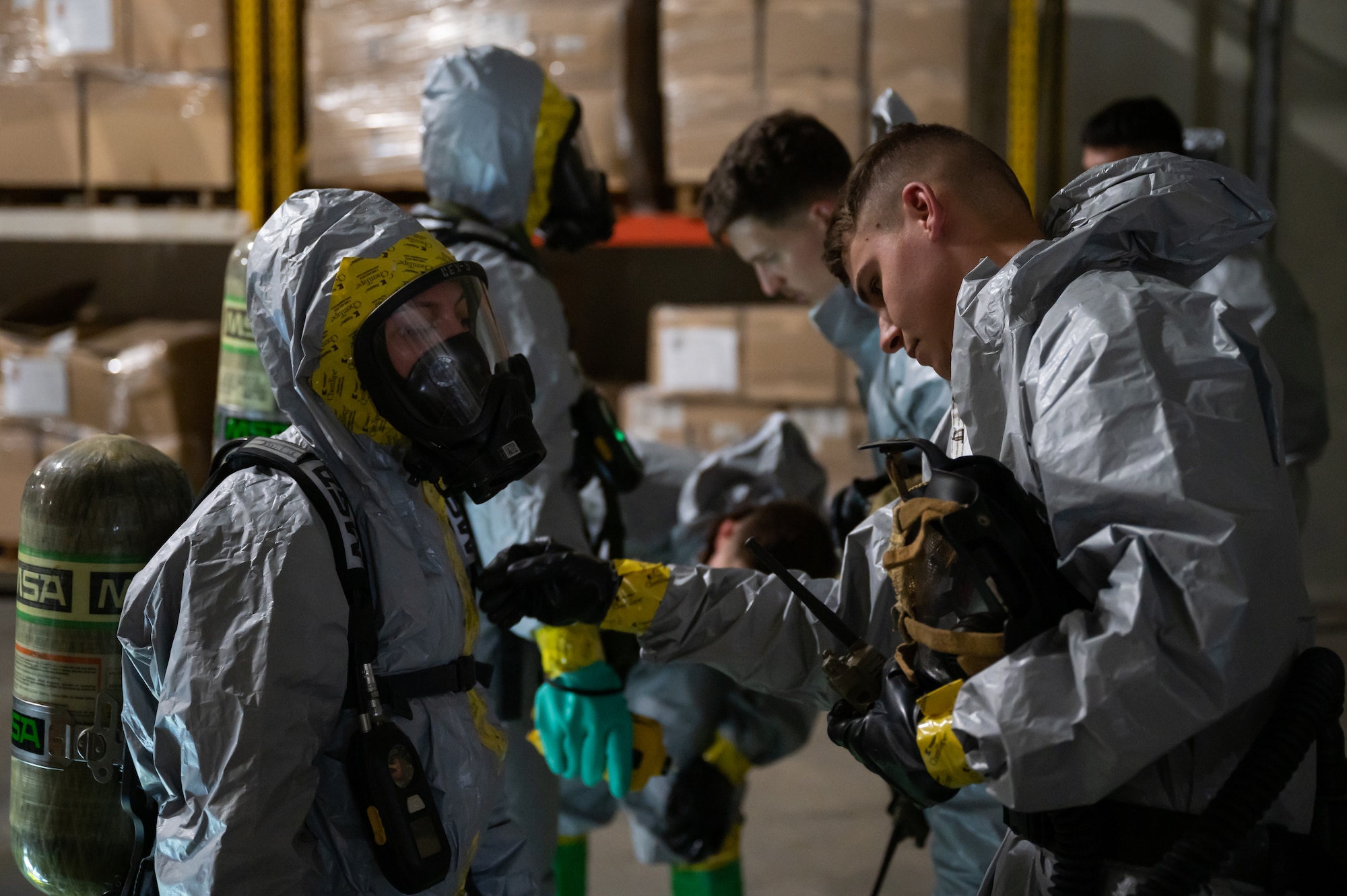 Airmen and Marines conduct buddy checks.