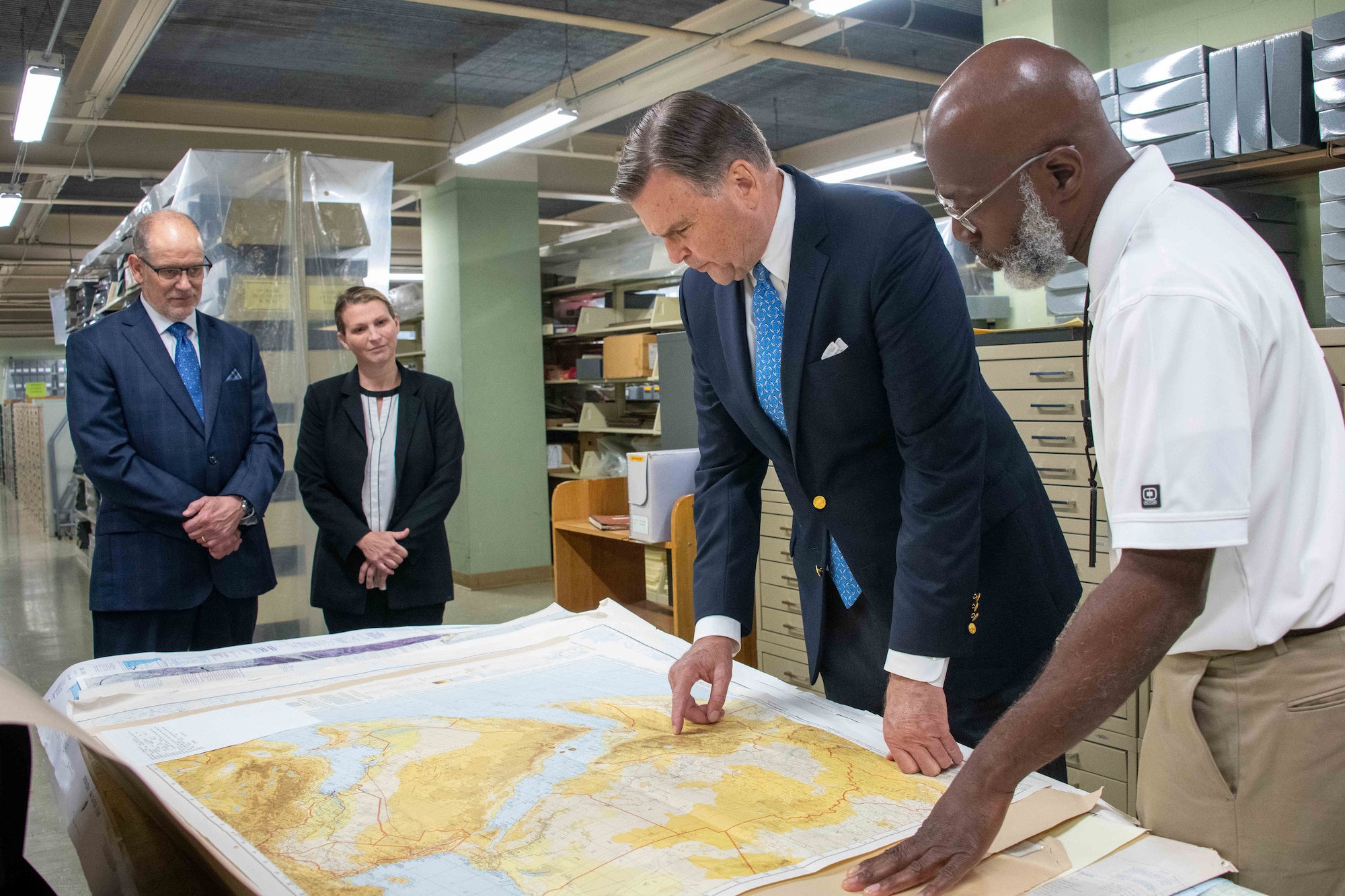 Juan Rackley, Air Force Historical Research Agency Stacks Manager, showcases specific archival holdings material pertaining to Ambassador (retired) W. Stuart Symington former embassy career