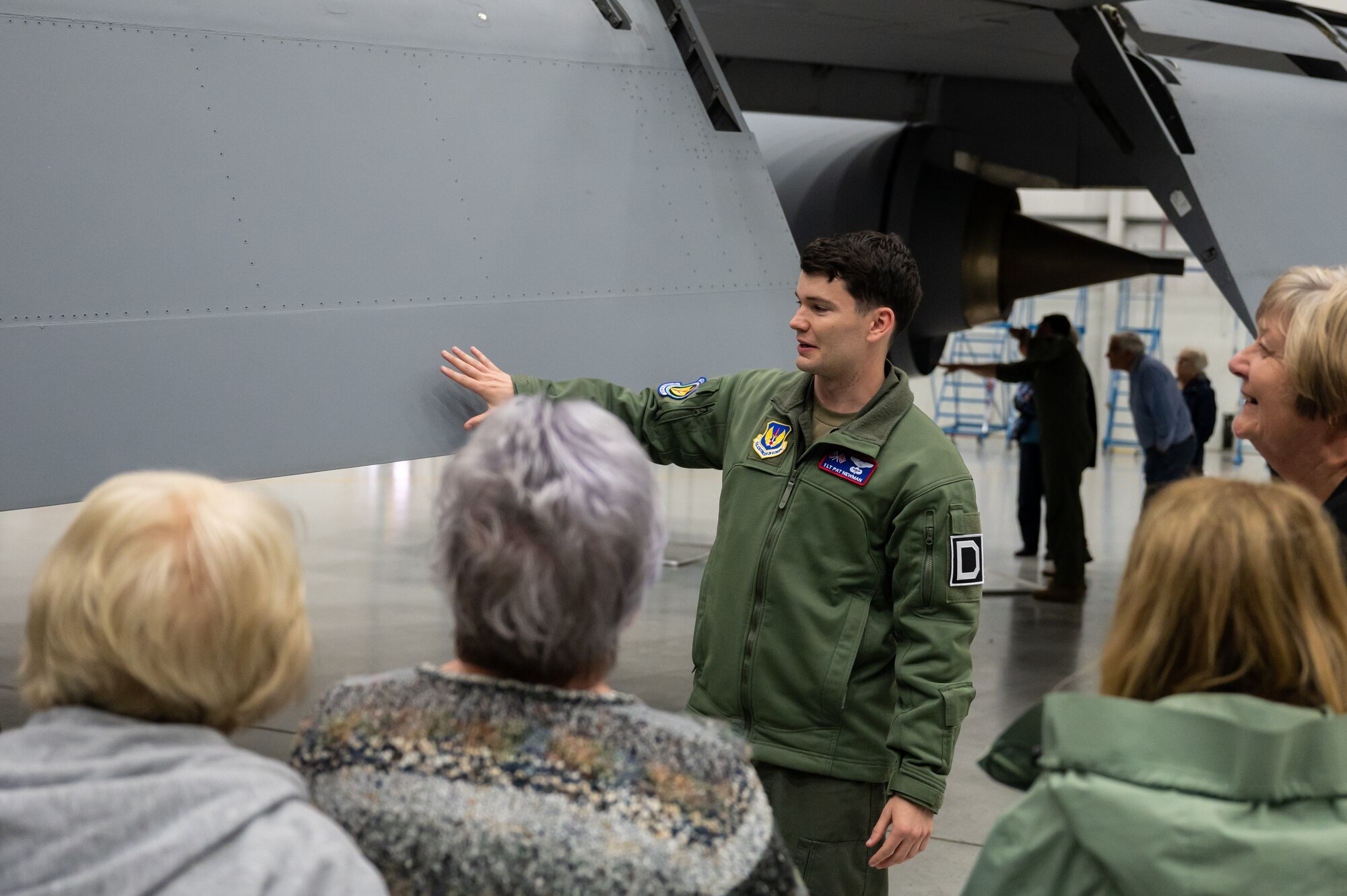 U.S. Air Force 1st Lt. Patrick Newman, 100th Operations Support Squadron mission planning officer and KC-135 Stratotanker aircraft pilot, speaks about different features of the KC-135 during a base tour at Royal Air Force Mildenhall, England, May 16, 2023.