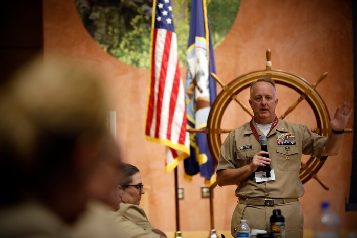 SILVER SPRING, Md. (May 17, 2023) Rear Adm. Darin K. Via, acting Navy surgeon general and acting chief, Bureau of Medicine and Surgery, speaks to members of the Fleet Health Integration Panel (FHIP) during a three-day meeting in support of the Fleet Commanders Readiness Council. Hosted by Naval Medical Research Command (NMRC), the FHIP brings together leaders in Navy Medicine to achieve standardized practices and present a unified view of Fleet Health Services to the line. Formerly known as Naval Medical Research Center, NMRC supports the Navy, Marine Corps and joint U.S. warfighters through research of infectious diseases, biological warfare detection and defense, combat casualty care, environmental health concerns, aerospace and undersea medicine, medical modeling, simulation, operational mission support, epidemiology and behavioral sciences. (U.S. Navy photo by Sidney Hinds/Released)