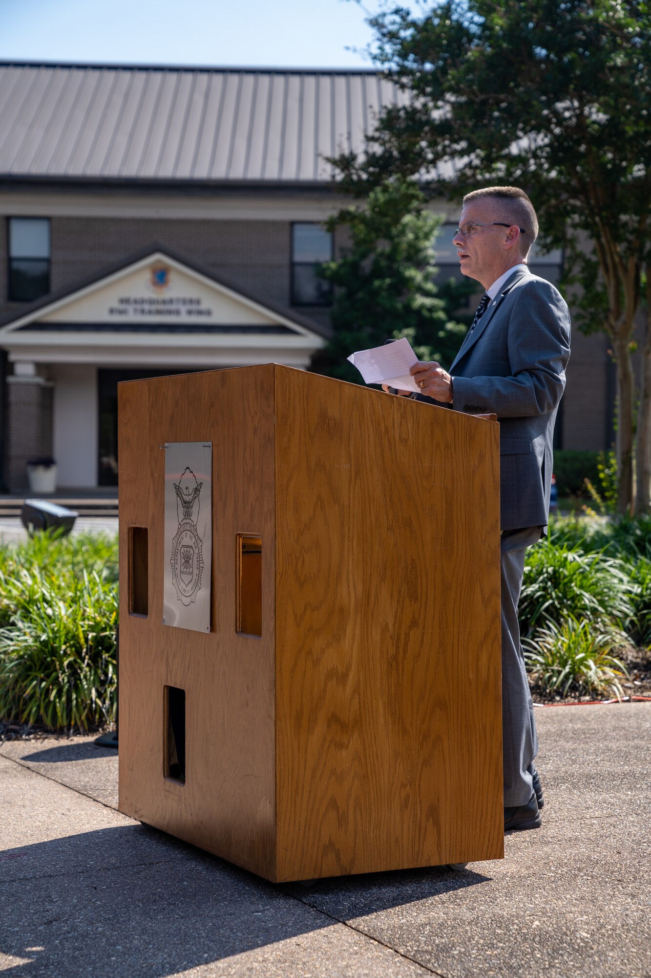 Chief Keith Bradley, Gulf Coast Veterans Affairs chief of police, gives his remarks during the retreat ceremony during National Police Week at Keesler Air Force Base, Mississippi, May 19, 2023.