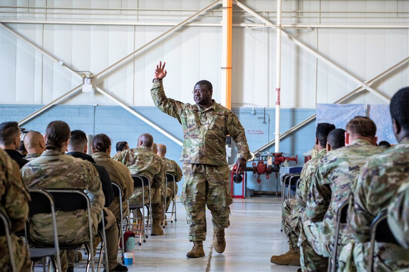 U.S. Air National Guard Master Sgt. Duke Elliot-Harmon, the first sergeant for 111th Civil Engineering Squadron here, makes an announcement during the 111th Attack Wing Mentorship May event at Biddle Air National Guard Base in Horsham, Pennsylvania, May, 7, 2023. Special guests for the event from Joint Force Headquarters at Fort Indiantown Gap, Pennsylvania, included ANG Brig. Gen. Mike Regan, the Deputy Adjutant General-Air and Commander of the Pennsylvania Air National Guard; and ANG Command Chief Paul Frisco, PAANG Command Chief, who led the discussion on Readiness. (U.S. Air National Guard courtesy photo by Matthew Bergh)