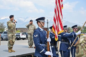 Airman 1st Class Nathan Van, 75th Security Forces Squadron, sings the National Anthem at the National Police Week closing ceremony May 19, 2023, at Hill Air Force Base, Utah. National Police Week honors law enforcement who have given their lives in the line of duty. (U.S. Air Force photo by Cynthia Griggs)