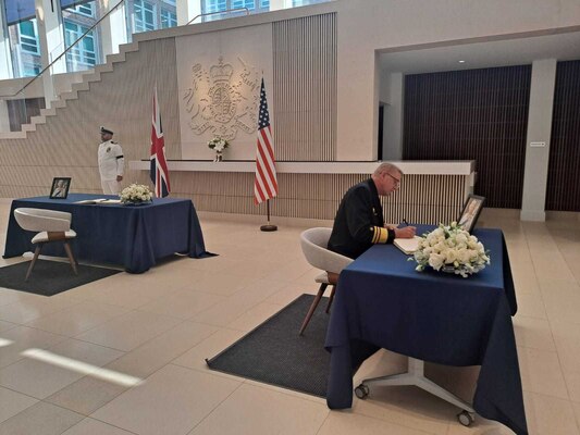 Vice Adm. Johnny Wolfe, Jr., Director, Strategic Systems Programs (SSP) signs the official condolence book for Her Late Majesty Queen Elizabeth II at the British Embassy. Wolfe’s visit underscored the importance of the special relationship between the United States and the United Kingdom, which includes the Polaris Sales Agreement, an international agreement established between the U.S. and the UK in April 1963. The agreement provides for the sale to the UK of the Trident Strategic Weapon System. (British Embassy Photo/Released).