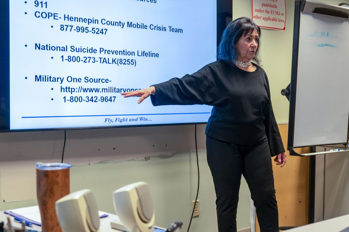 Rita Shedd, the 934th Airlift Wing director of psychological health, briefs a group of Airmen about the 934th Aeromedical Staging Squadron mental health office at the Minneapolis-St. Paul Air Reserve Station, Minnesota, May 6, 2023. The 934 ASTS mental health office was in attendance to answer a variety of questions regarding mental health, including resources on the installation that Airmen can turn to in times of need. (U.S. Air Force photo by Senior Airman Matthew Reisdorf)