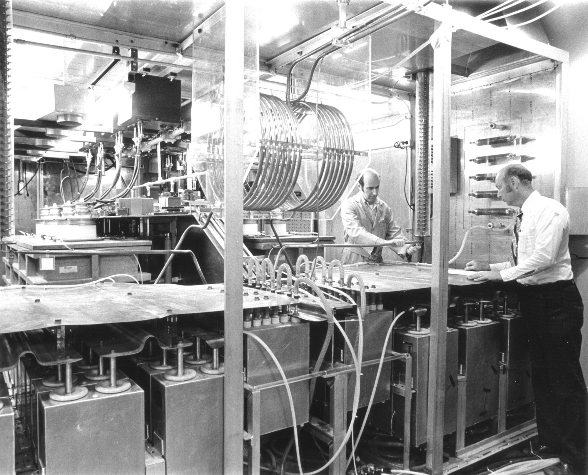 Dr. James Cunningham, right, works in a test facility at Arnold Air Force Base, Tenn., in the 1970s. Cunningham, honored as an Arnold Engineering Development Complex Fellow in 2006, passed away May 11, 2023. He spent more than 40 years of his 55-year career at Arnold AFB. (U.S. Air Force photo)