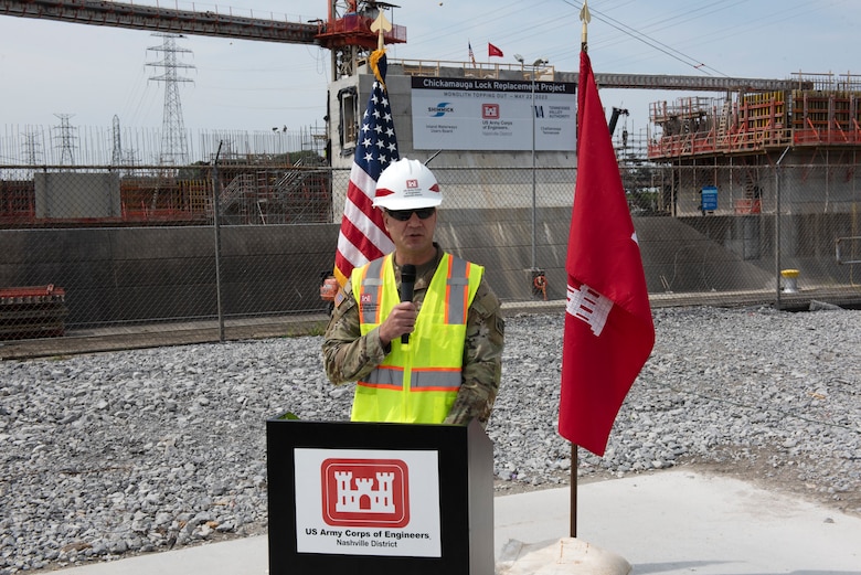 Lt. Col. Joseph Sahl, Nashville District commander, speaks during a topping-off ceremony marking the completion of the first of 36 monoliths of the lock chamber for the Chickamauga Lock Replacement Project on the Tennessee River in Chattanooga, Tennessee. (USACE Photo by Lee Roberts)