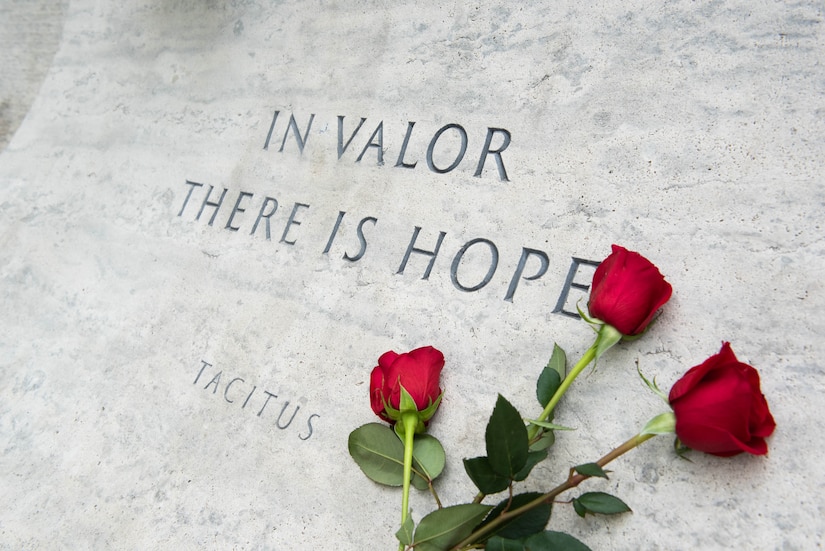 Red Roses lay above engraved words at the National Law Enforcement Officers Memorial, in Washington D.C.