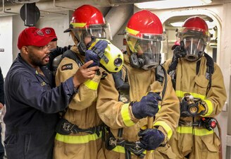 USS Shiloh (CG 67) damage control training in the East China Sea.