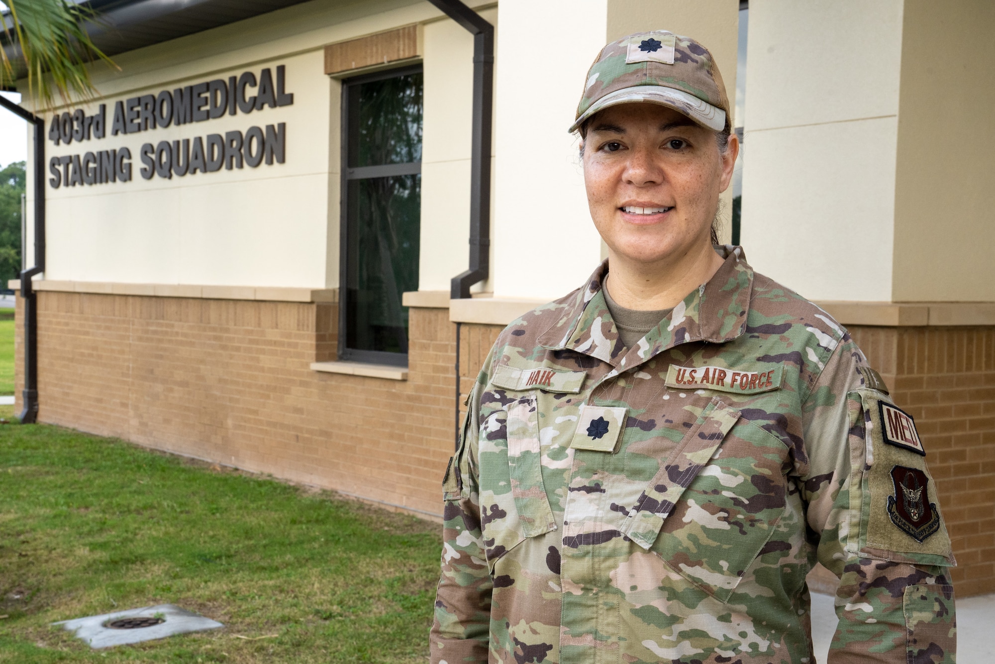 Lt. Col. Haik stands outside of the Aeromedical Staging Squadron building