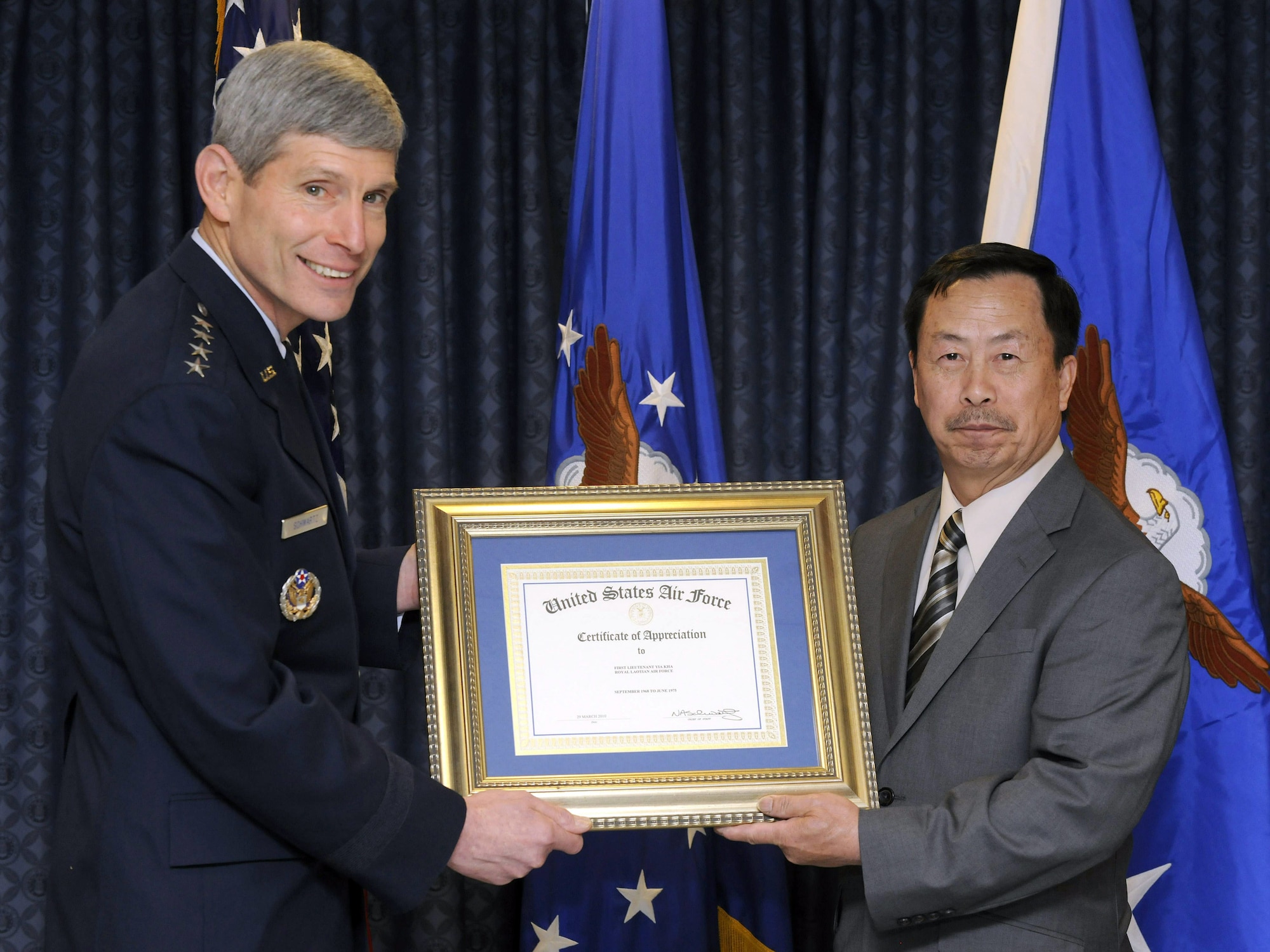 Yia Kha and Air Force Chief of Staff Gen. Norton Schwartz