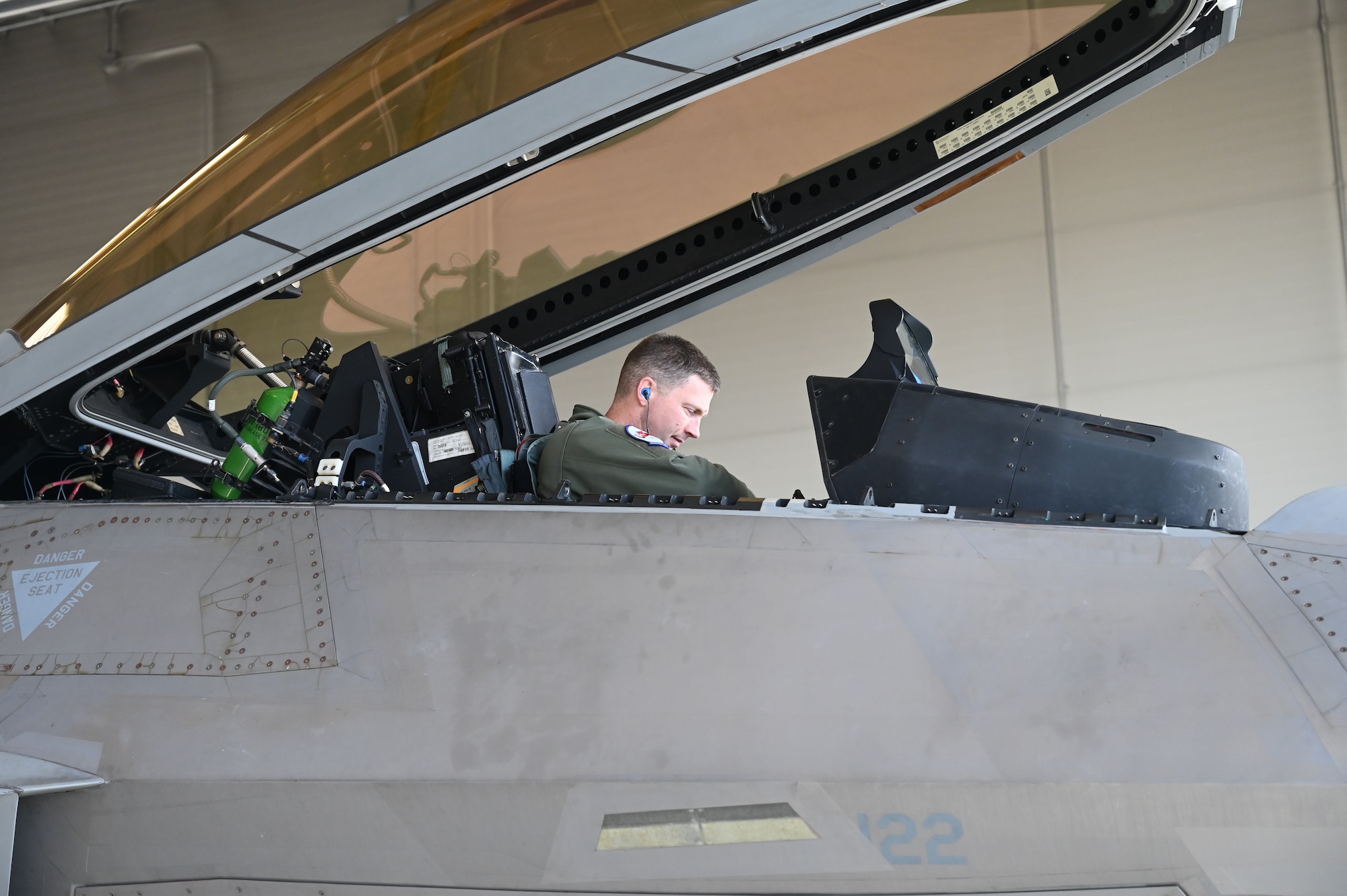 Lt. Col. Ryan Enlow prepares for flight during exercise Northern Edge.