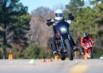 Members of team Seymour participate in a motorcycle safety course at Seymour Johnson Air Force Base, North Carolina Dec. 14, 2021. Basic riding course is mandated by the Air Force for all service members who wish to ride motorcycles. (U.S. Air Force courtesy photo by Airman 1st Class Hadley Neish)