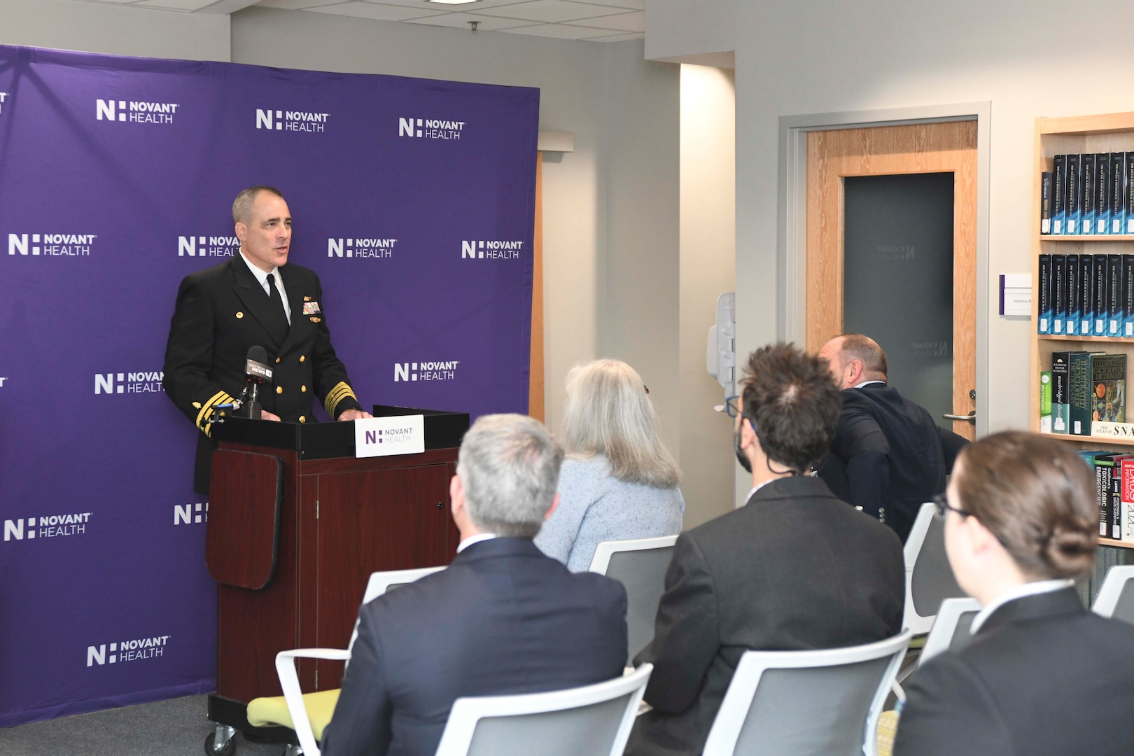 Naval Medical Center Camp Lejeune Director Captain Kevin Brown helps announce the Psychiatry Residency Program, a partnership with Novant Health, UNC Health and the UNC School of Medicine.