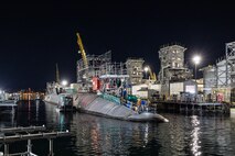 USS Pennsylvania (SSBN 735) enters Dry Dock 4 May 11, 2023, beginning an 18-month Extended Refit Period at Puget Sound Naval Shipyard & Intermediate Maintenance Facility in Bremerton, Washington. It will be the first extended refit performed on a ballistic missile submarine at PSNS & IMF. (U.S Navy photo by Jeb Fach)