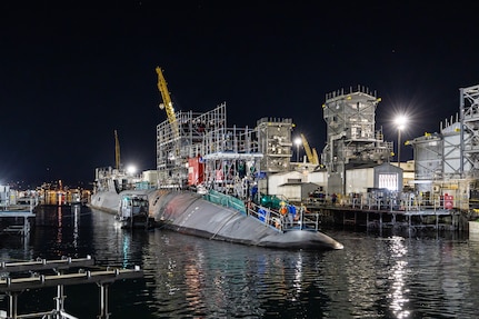 USS Pennsylvania (SSBN 735) enters Dry Dock 4 May 11, 2023, beginning an 18-month Extended Refit Period at Puget Sound Naval Shipyard & Intermediate Maintenance Facility in Bremerton, Washington. It will be the first extended refit performed on a ballistic missile submarine at PSNS & IMF. (U.S Navy photo by Jeb Fach)