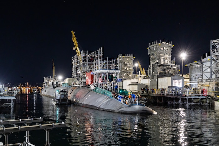 USS Pennsylvania (SSBN 735) enters Dry Dock 4 May 11, 2023, beginning an 18-month Extended Refit Period at Puget Sound Naval Shipyard & Intermediate Maintenance Facility in Bremerton, Washington. It will be the first extended refit performed on a ballistic missile submarine at PSNS & IMF. (U.S Navy photo by Jeb Fach)