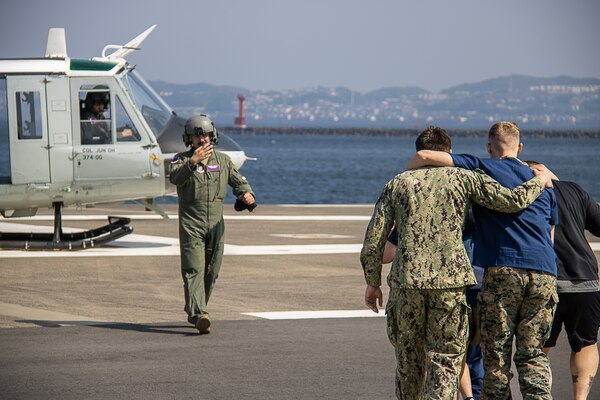 USNMRTC Sailors and 459th Airlift Squadron pilots help to evacuate simulated patients from Yokosuka Naval Base at a large-scale, multi-day, joint-partner exercise to promote interoperability and readiness at USNH Yokosuka
