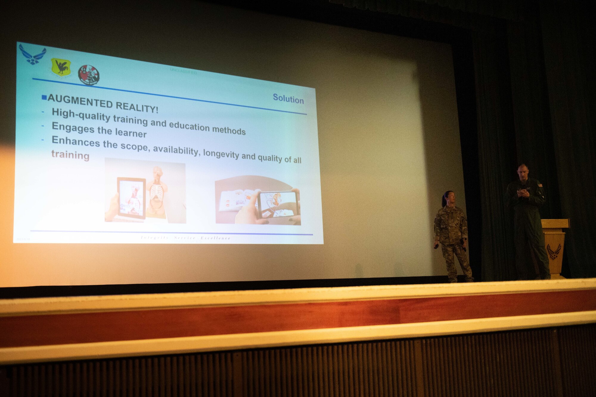 Airmen pitch their innovation idea during a competition
