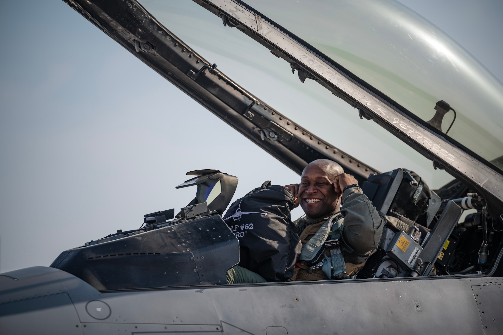 Col. Henry R. Jeffress, III, 8th Fighter Wing commander, prepares to disembark upon completing his final flight in an F-16 Fighting Falcon at Osan Air Base, Republic of Korea, May 17, 2023. As a commander, Jeffress plays a key role in the execution of military operations to include counter-air, aerial interdiction, and close-air support on the Korean Peninsula. (U.S. Air Force photo by Senior Airman Karla Parra)