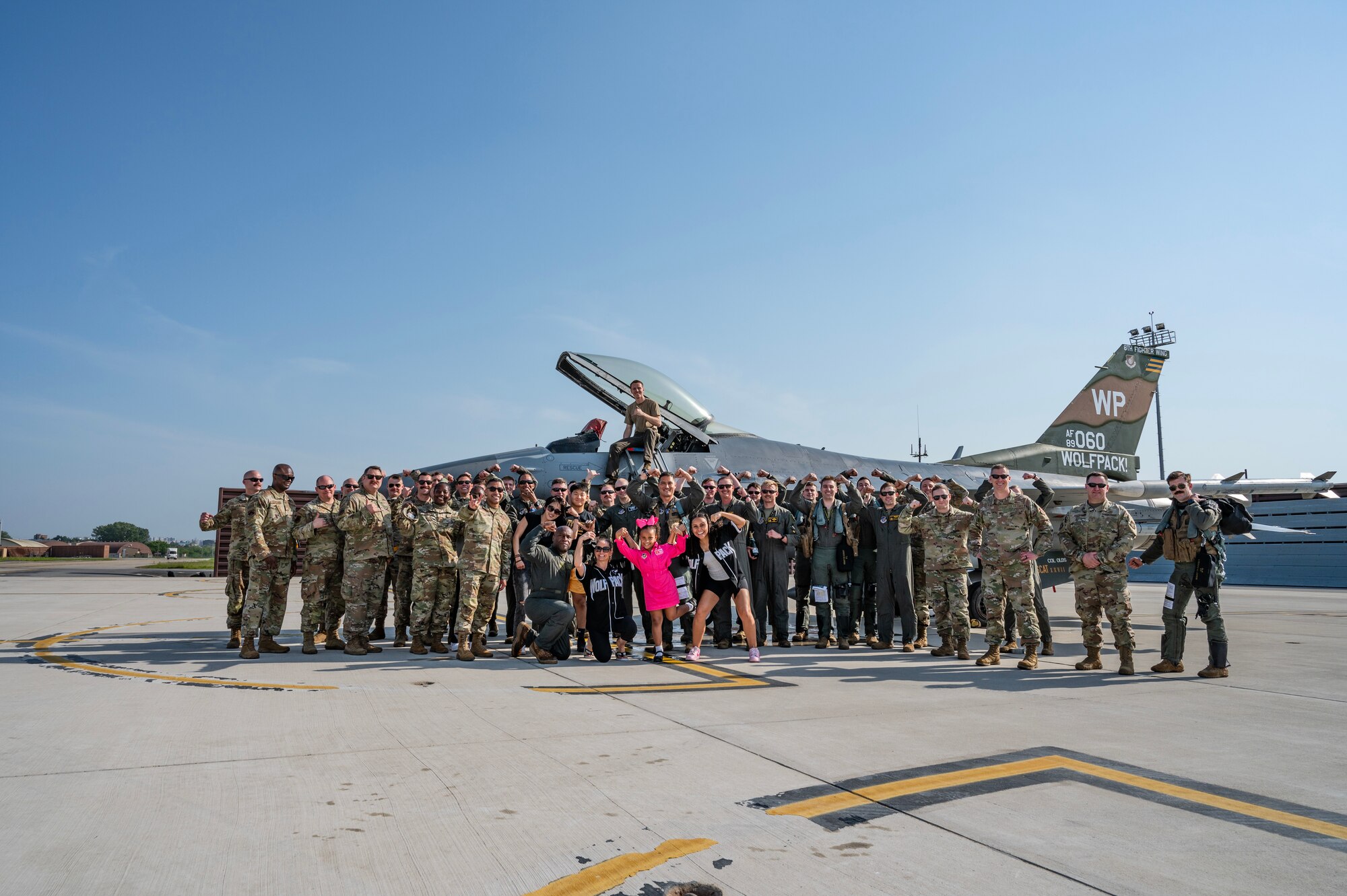 Col. Henry R. Jeffress III, 8th Fighter Wing commander, gathers for a photo with family and Airmen in front of an F-16 Fighting Falcon upon completion of his final flight at Osan Air Base, Republic of Korea, May 17, 2023. Prior to taking command of the 8 FW, Jeffress served as the vice commander for the 51 FW, Osan Air Base, Republic of Korea. (U.S. Air Force photo by Capt. Kaylin P. Hankerson)