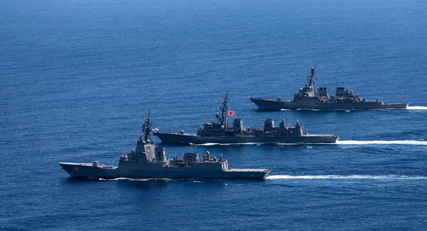 The Arleigh Burke-class guided-missile destroyer USS Milius (DDG 69) steams in formation with the Japan Maritime Self-Defense Force Murusame-class destroyer JS Kirisame (DD 104) and the Royal Australian Navy Hobart-class air warfare destroyer HMAS Hobart (DDG 39) while operating in the South China Sea, Oct. 07, 2022. Milius is assigned to Commander, Task Force 71/Destroyer Squadron (DESRON) 15, the Navy’s largest forward-deployed DESRON and the U.S. 7th Fleet’s principal surface force. (Courtesy photo)