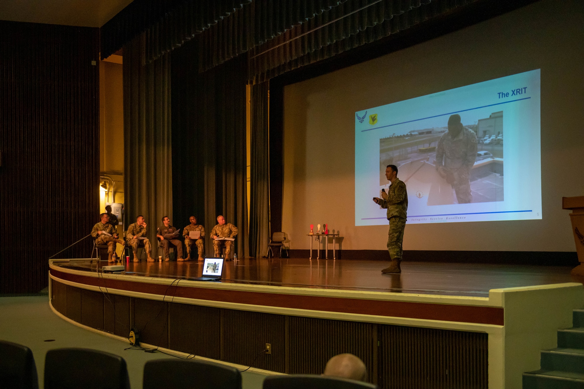 Airman pitches his innovation idea during a competition