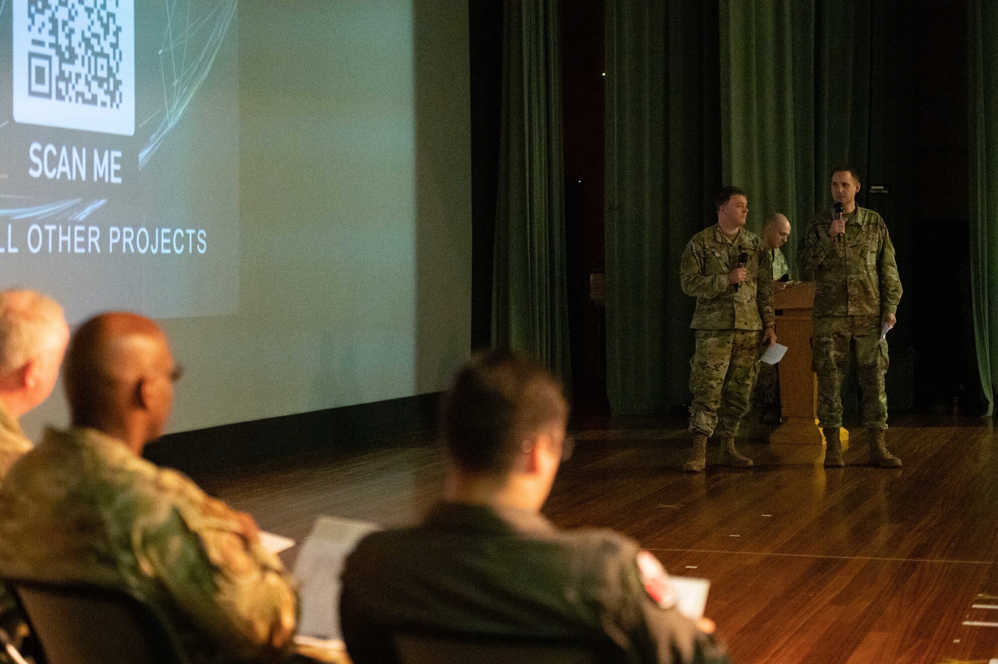Airmen pitch their innovation idea during a competition