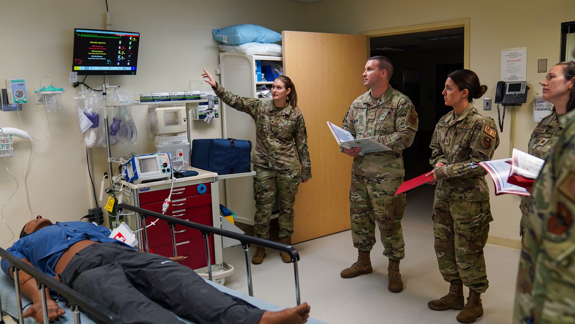 U.S. Air Force Capt. Kimberly Warstler, 81st Healthcare Operations Squadron emergency department flight commander, familiarizes Advanced Life Support Course students with the training equipment in the simulation lab at the Keesler Medical Center on Keesler Air Force Base, Mississippi, May 17, 2023.