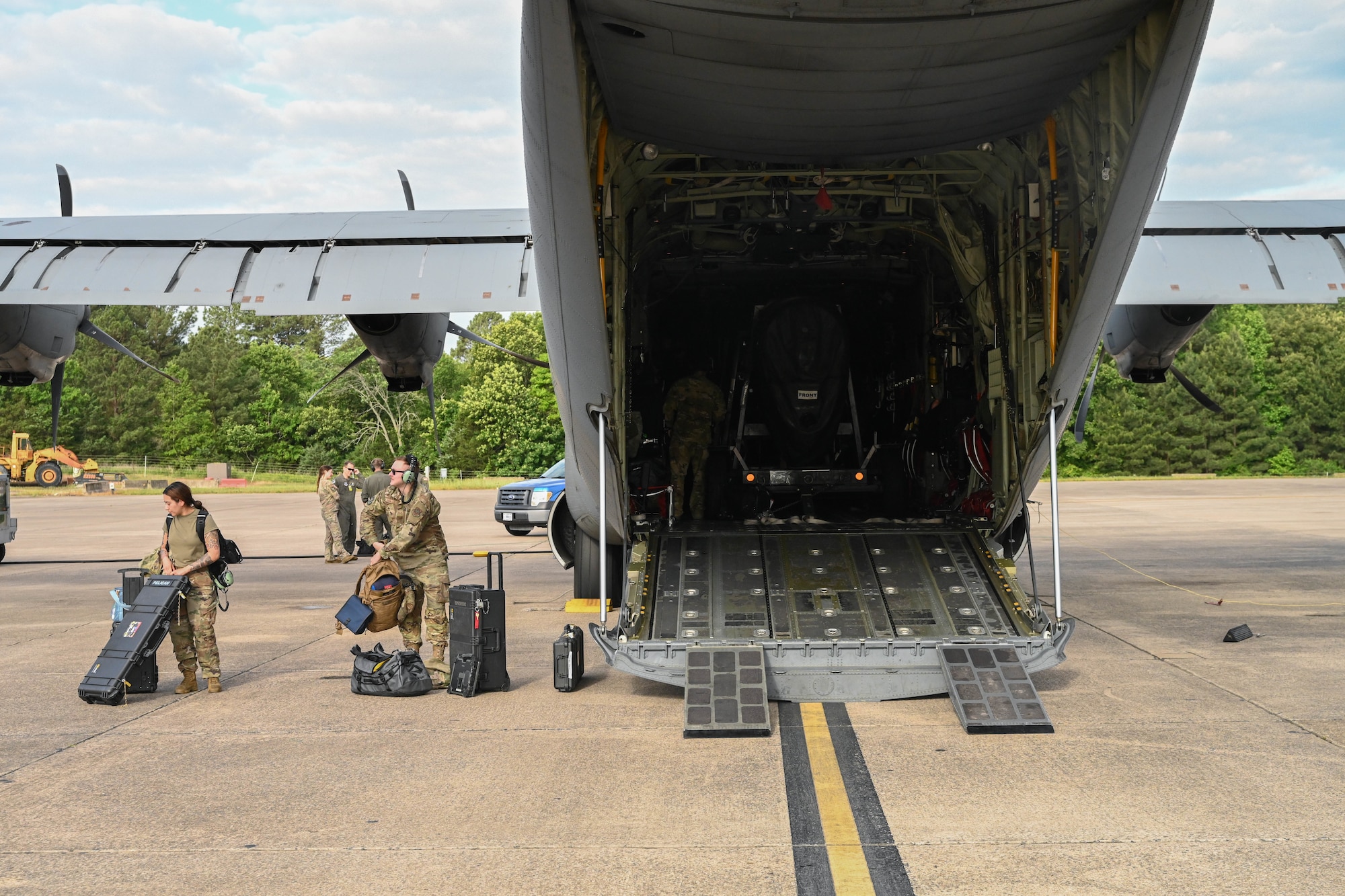 Airmen and aircraft from the 19th Airlift Wing participate in a rocket launch exercise